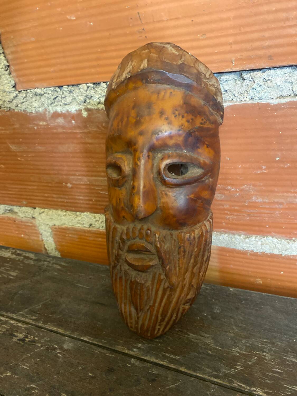 Moroccan mask in carved wood vintage decoration