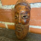 Moroccan mask in carved wood vintage decoration