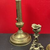 Set of 4 disparate brass candlesticks
