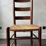 Set of 8 wooden chairs with rattan seats from the 1950s
