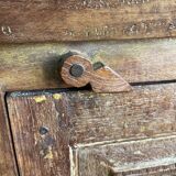 India. Bonnetière with a teak door finely carved by hand.