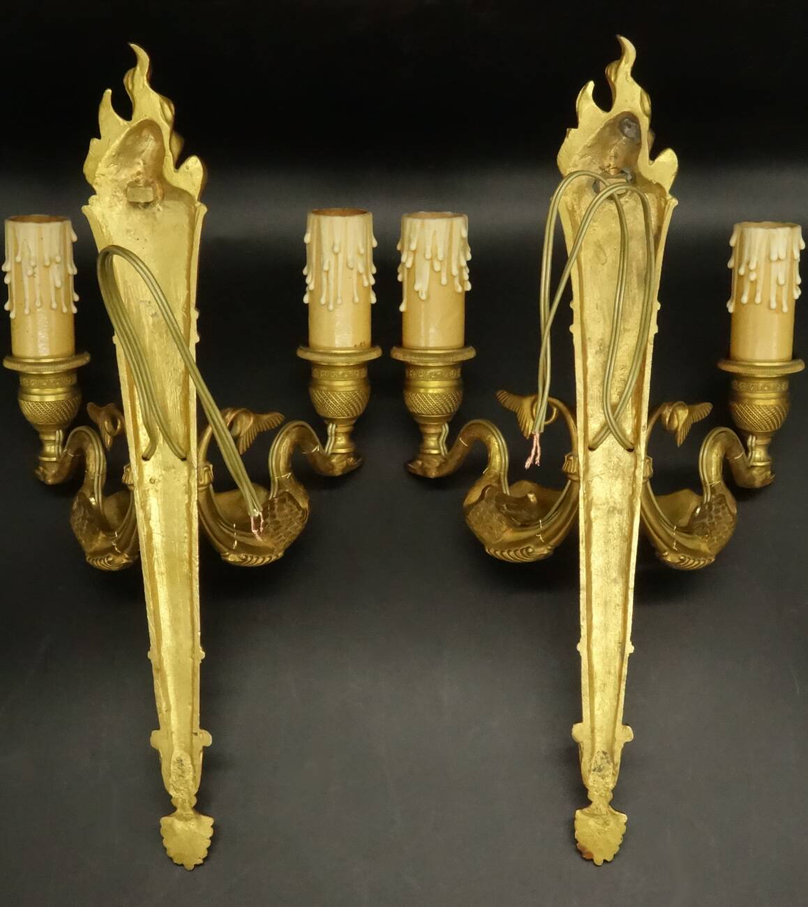 Pair of large wall sconces, torch and swans, Empire style - gilded bronze