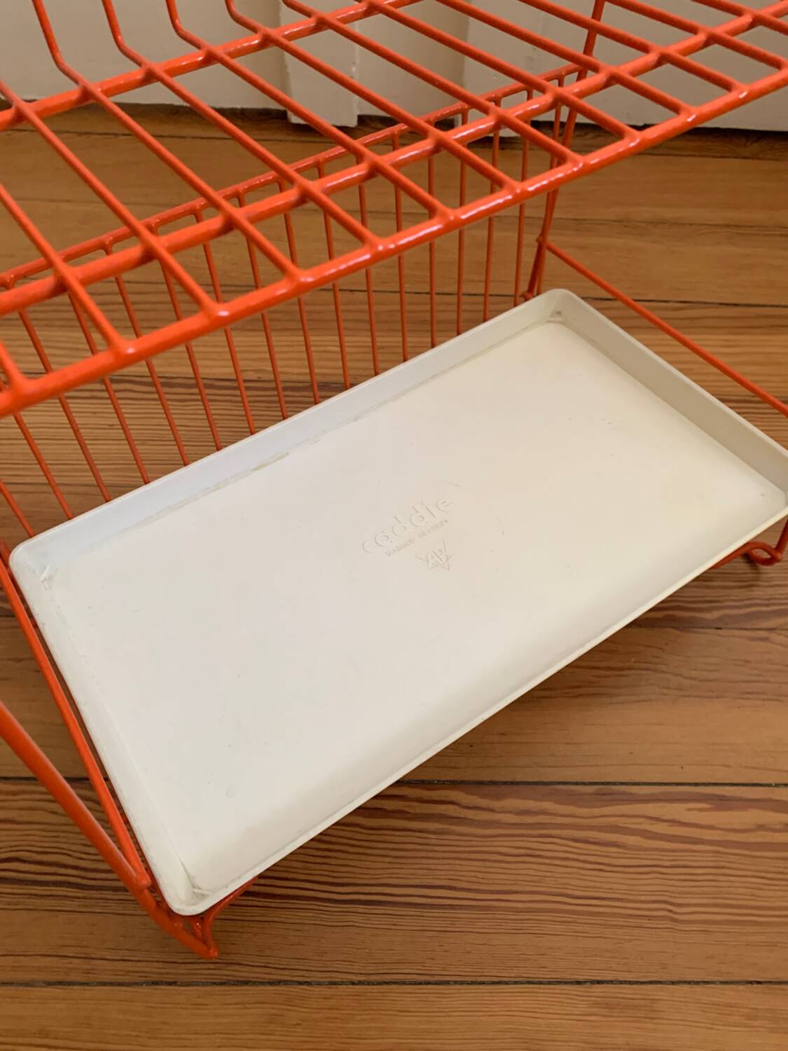 Authentic orange vintage metal drainer shelf from the Caddy brand