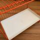 Authentic orange vintage metal drainer shelf from the Caddy brand