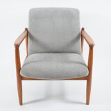 Original restored vintage armchair, designer E. Homma, grey fabric