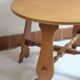 Round beech coffee table with curved legs, 1980s.