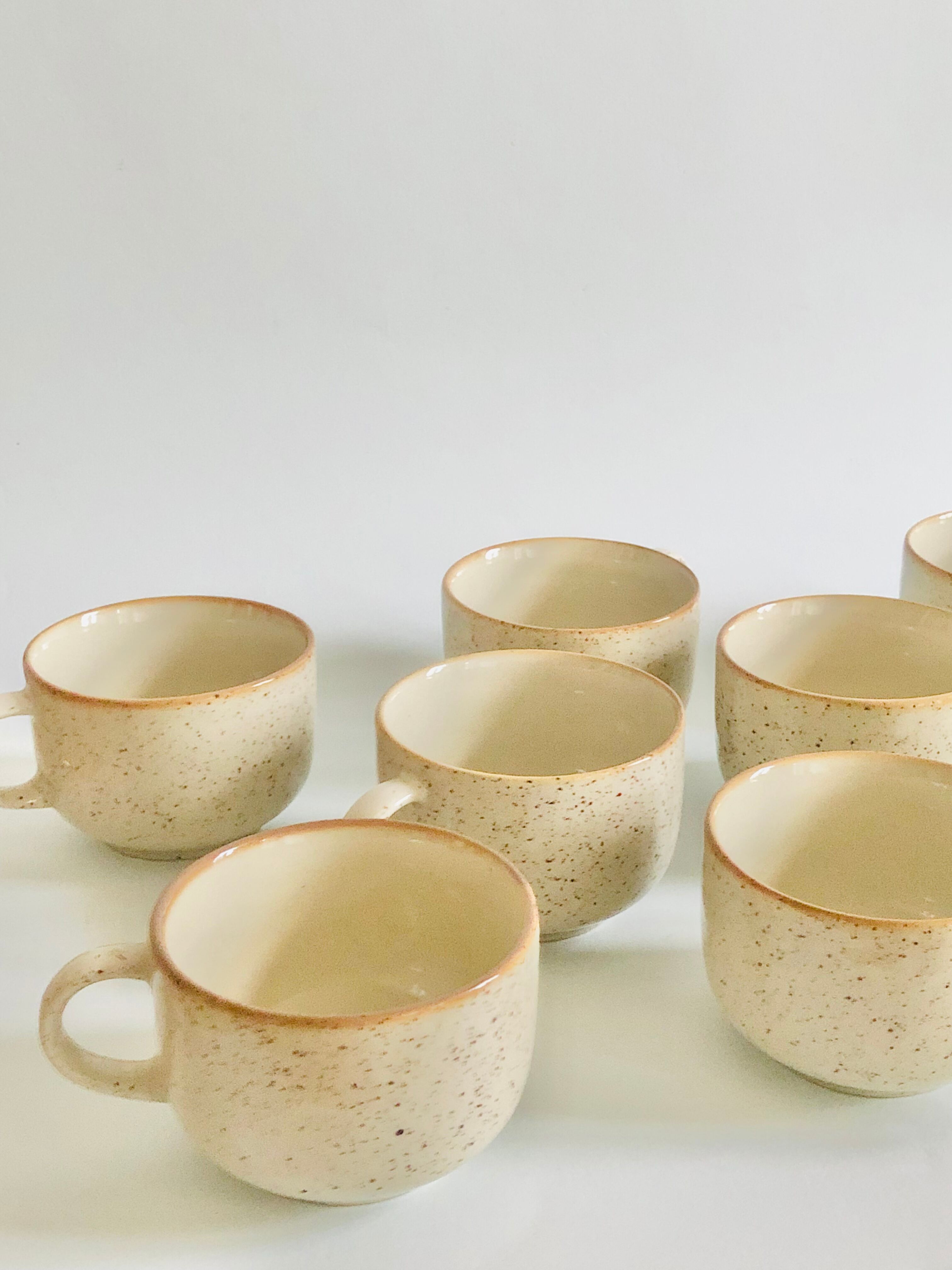 Set of 9 speckled ceramic coffee cups