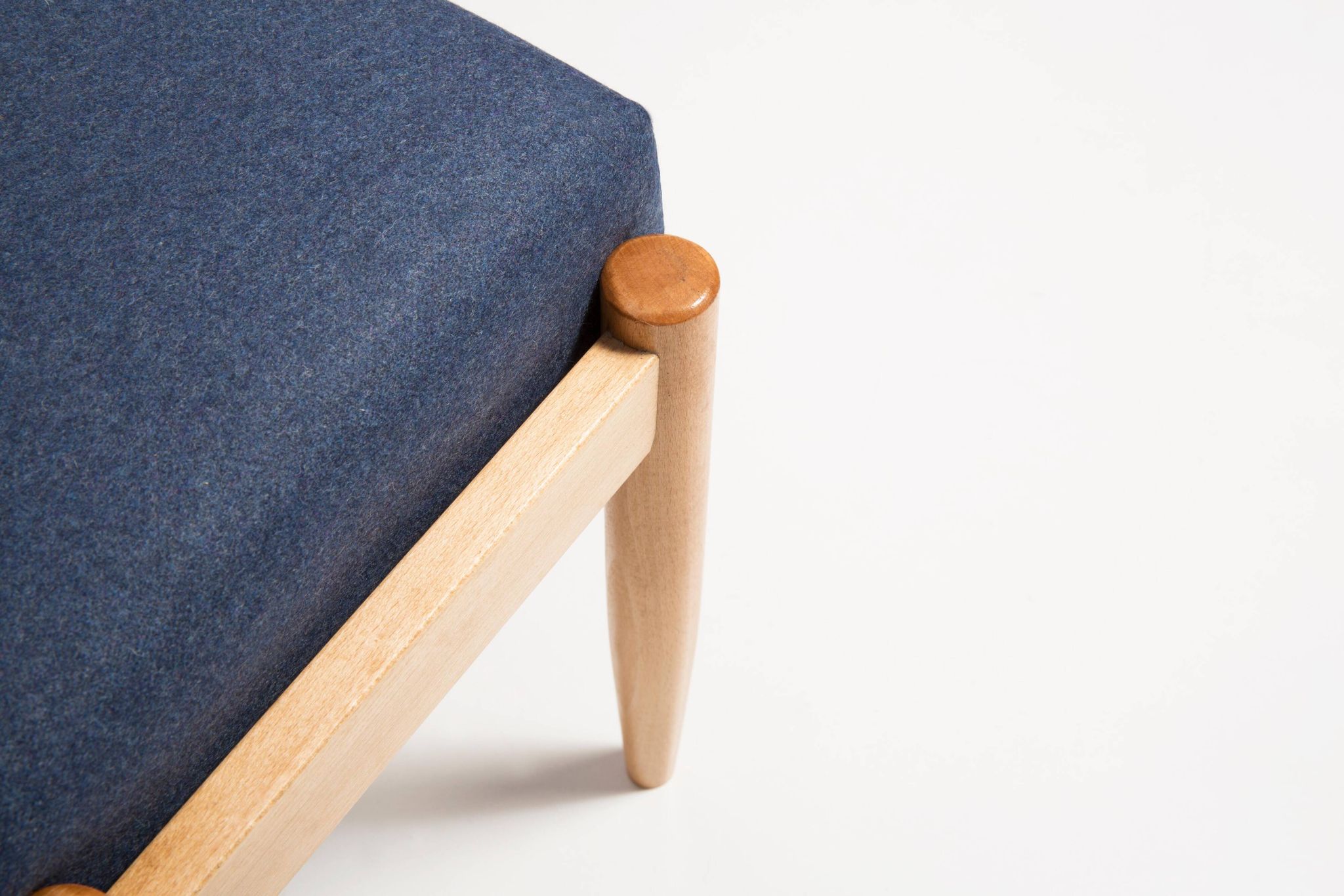 Pair of vintage navy blue wool stools from the mid-20th century, Edmund Homa, 1960s.