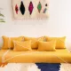 Set of yellow Moroccan floor sofa covers.