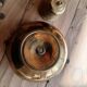Brass candle holder in the shape of a flower.