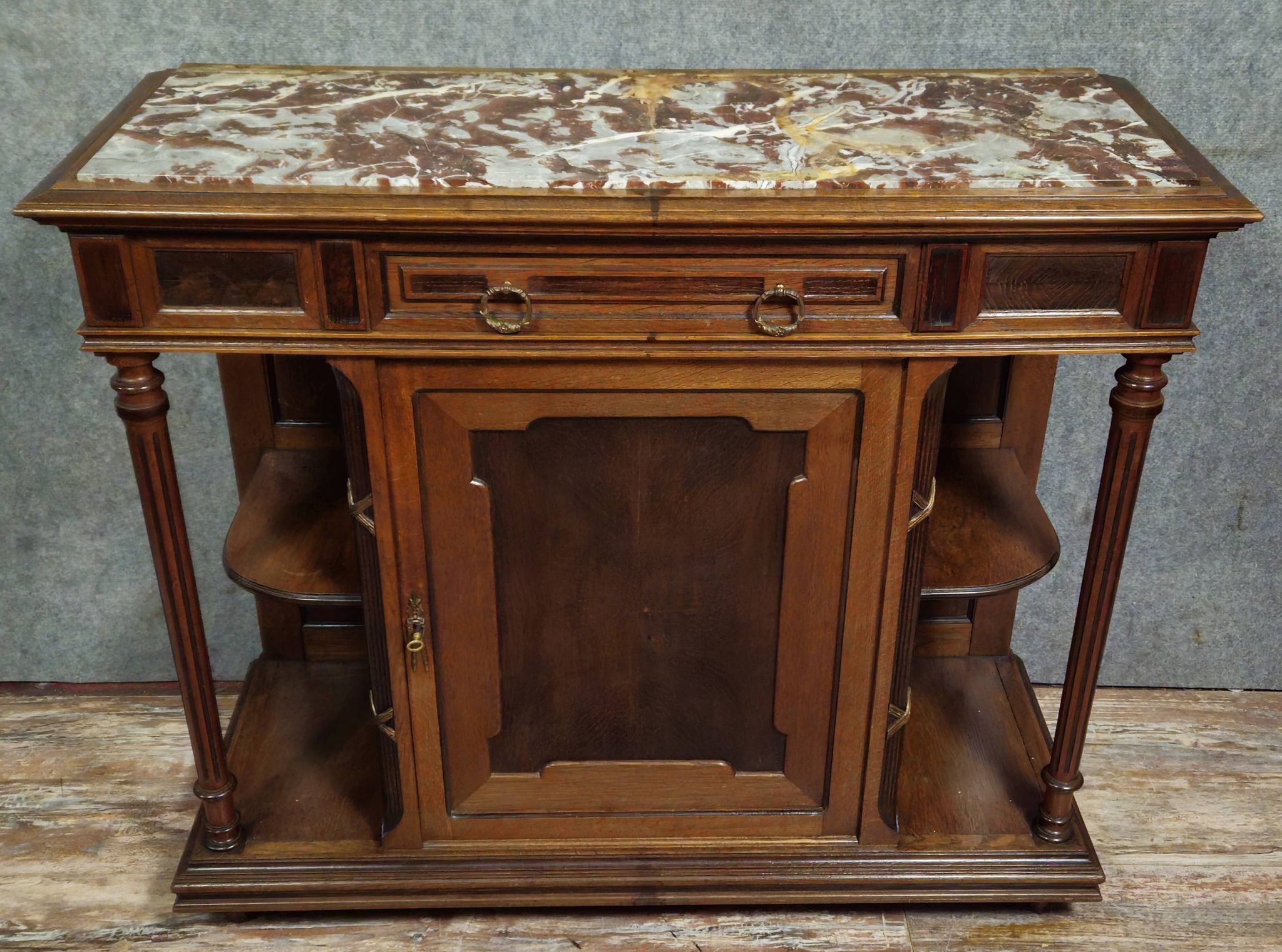 Antique low furniture of the buffet / sideboard / serving table type in Louis XVI style.