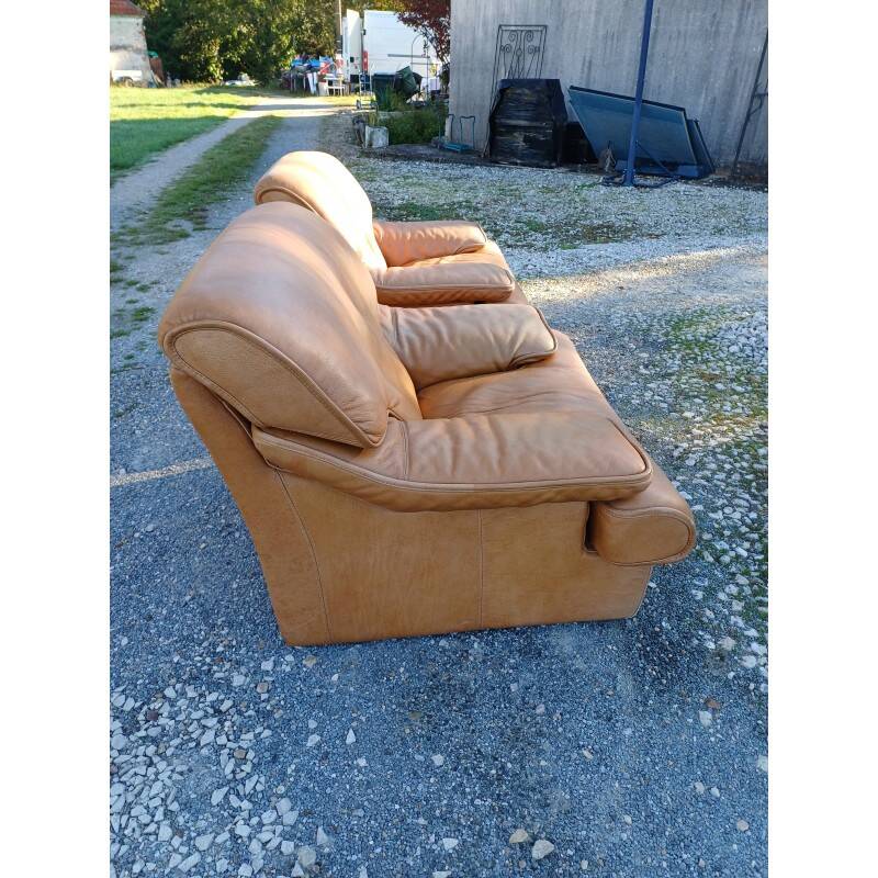 Paire de fauteuils vintage en skaï marron clair