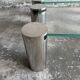 Pair of modernist coffee tables with cylindrical steel legs