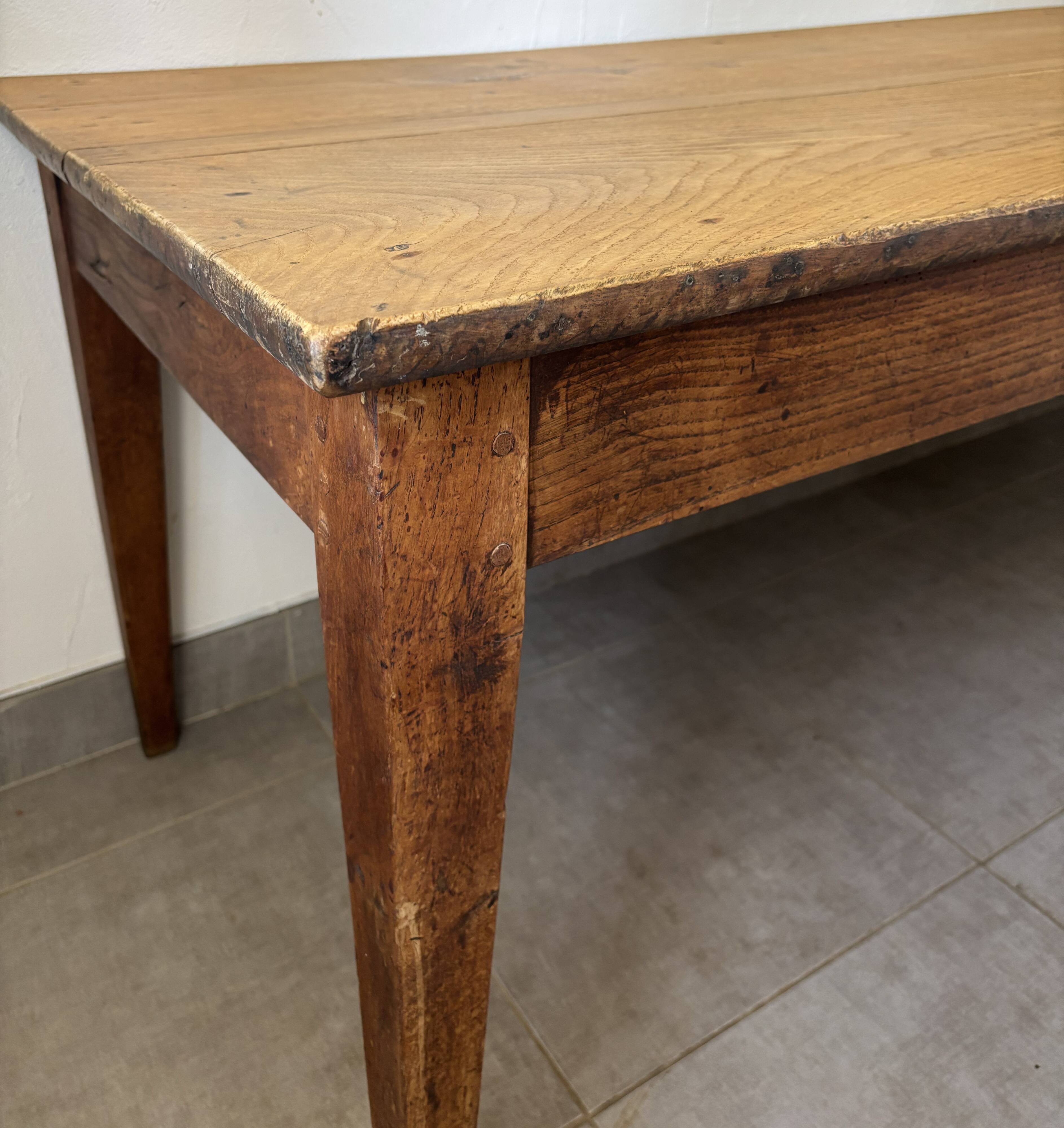 Authentic vintage farmhouse table from the 1950s in solid oak.