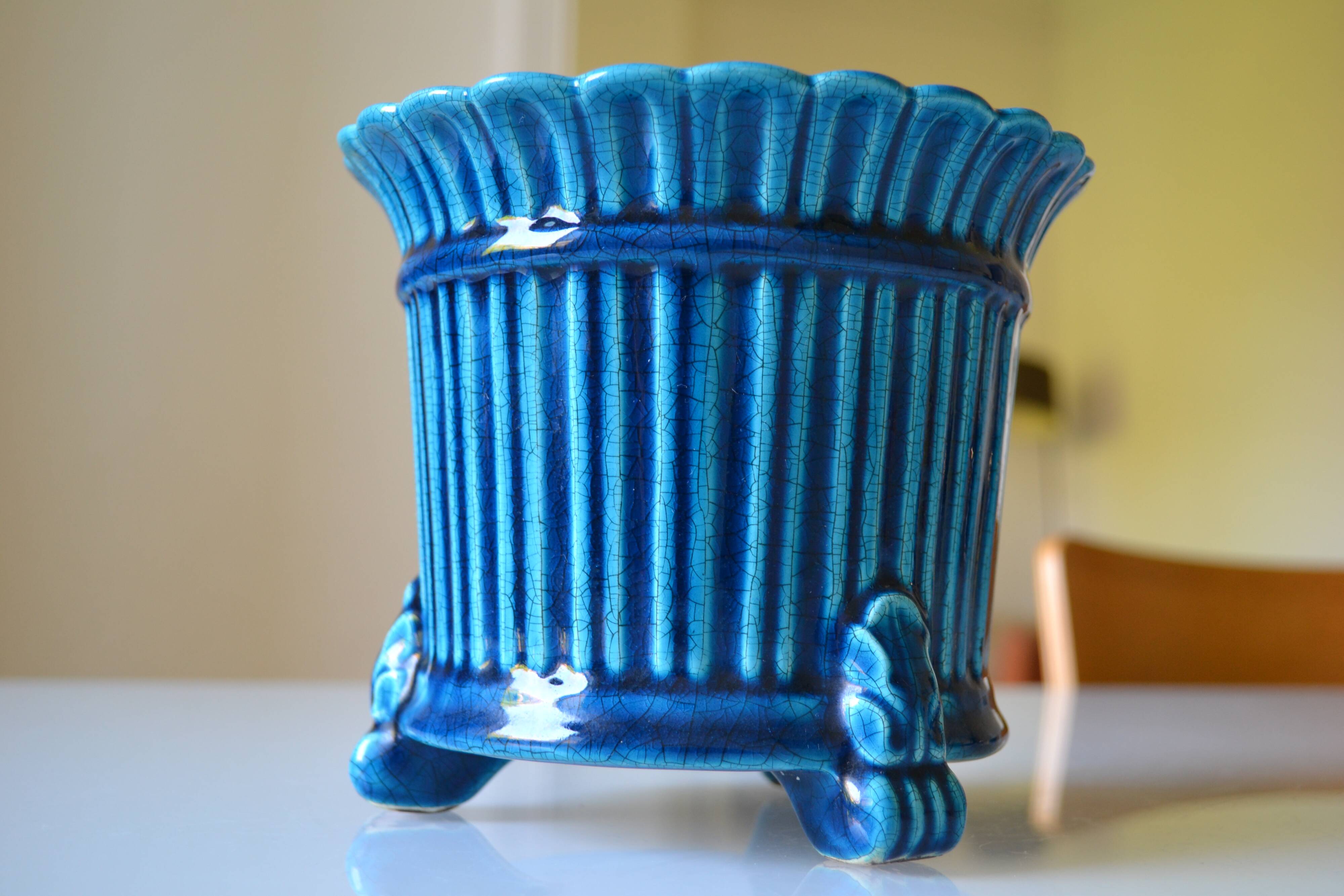 Cracked blue ceramic cache pot