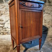 French antique bedside table in walnut with a marble top and porcelain interior, early 20th century.