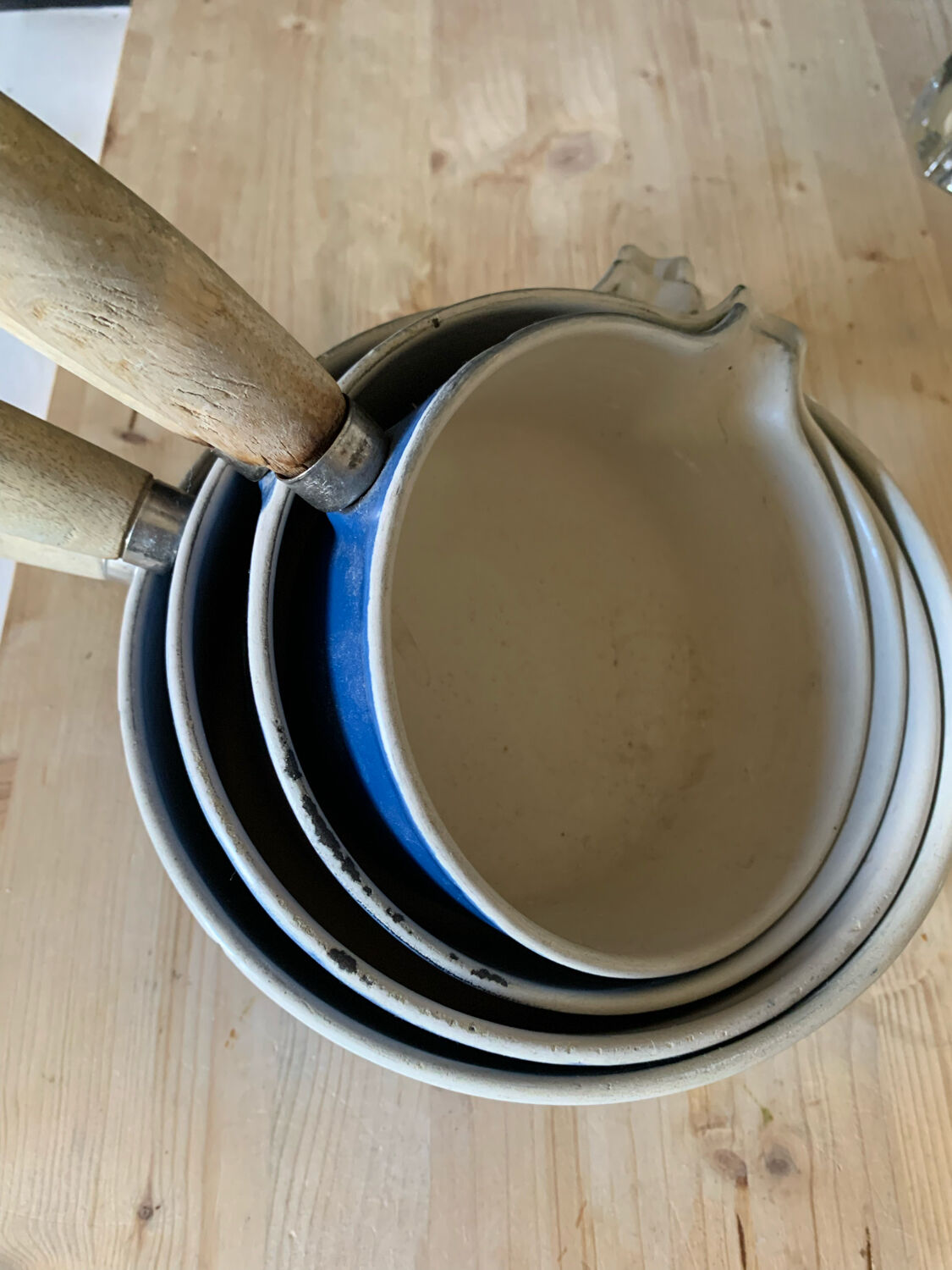 Series of cast iron pans Le Creuset bleues