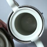Art Deco porcelain coffee pot by SUS Bavaria with a metal warming hood by WMF, comes from the 1920s