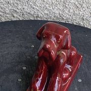 Dog sign CAB in vintage burgundy red enameled ceramic slip, art deco