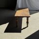 Brown Indonesian teak coffee table, with a border and cylindrical legs H40 L103.