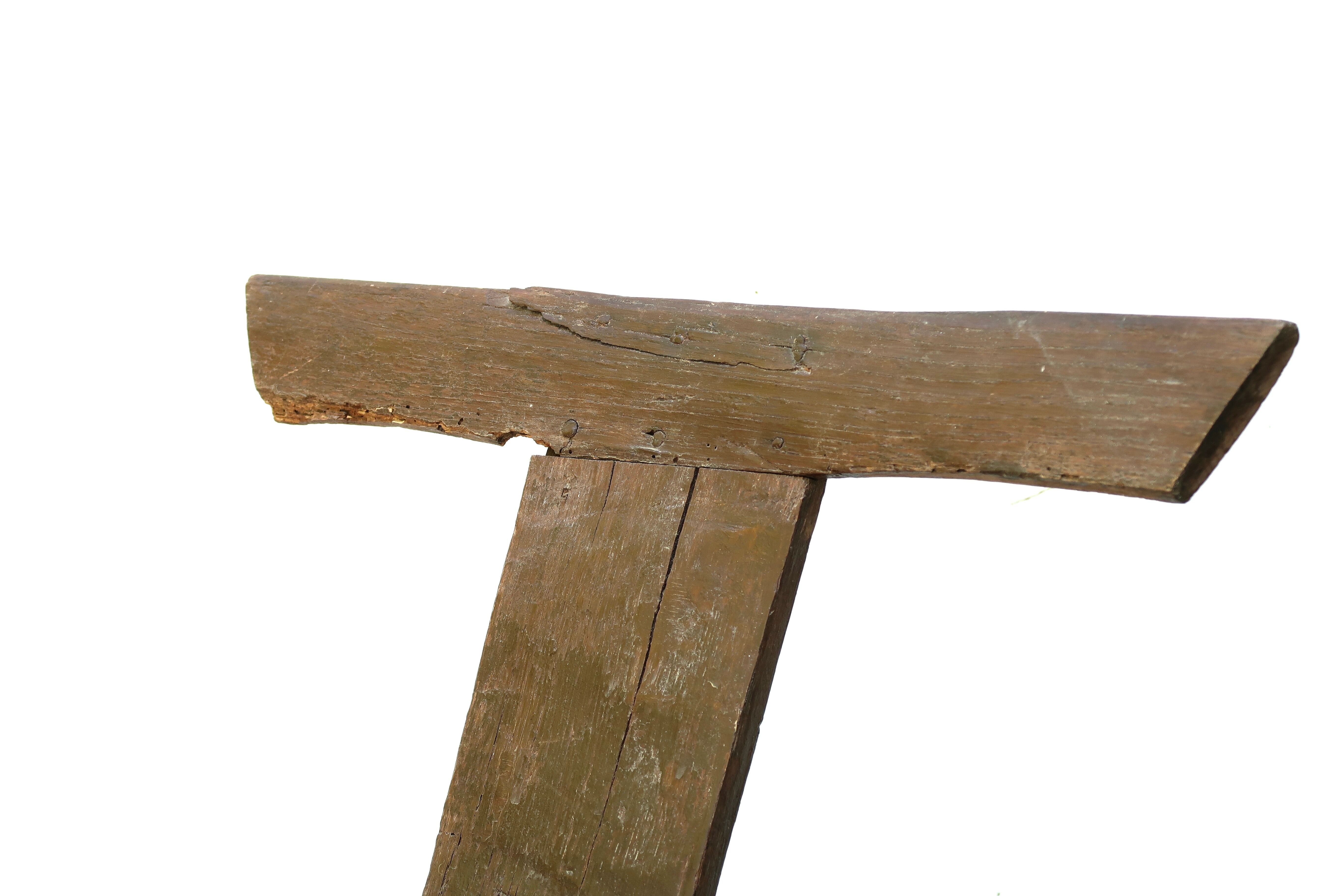 Regionalist wooden tripod chair