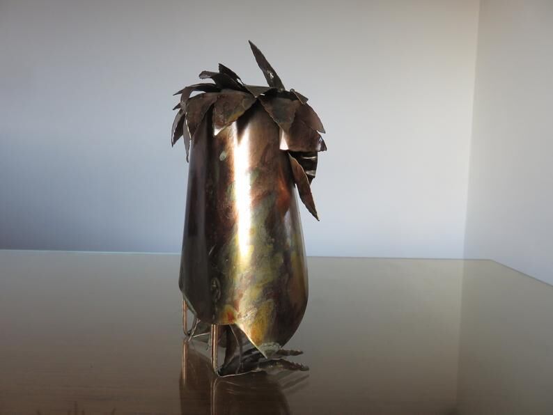 Owl in 1970s brutalist plate