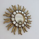 Sun mirror in gilded wood with inlays