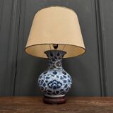 Blue and white porcelain lamp from China, 20th century, on wooden stand
