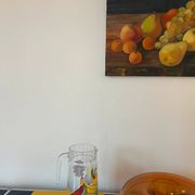 Vintage glass carafe with painted fruits