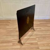 Antique metal fireplace screen.
