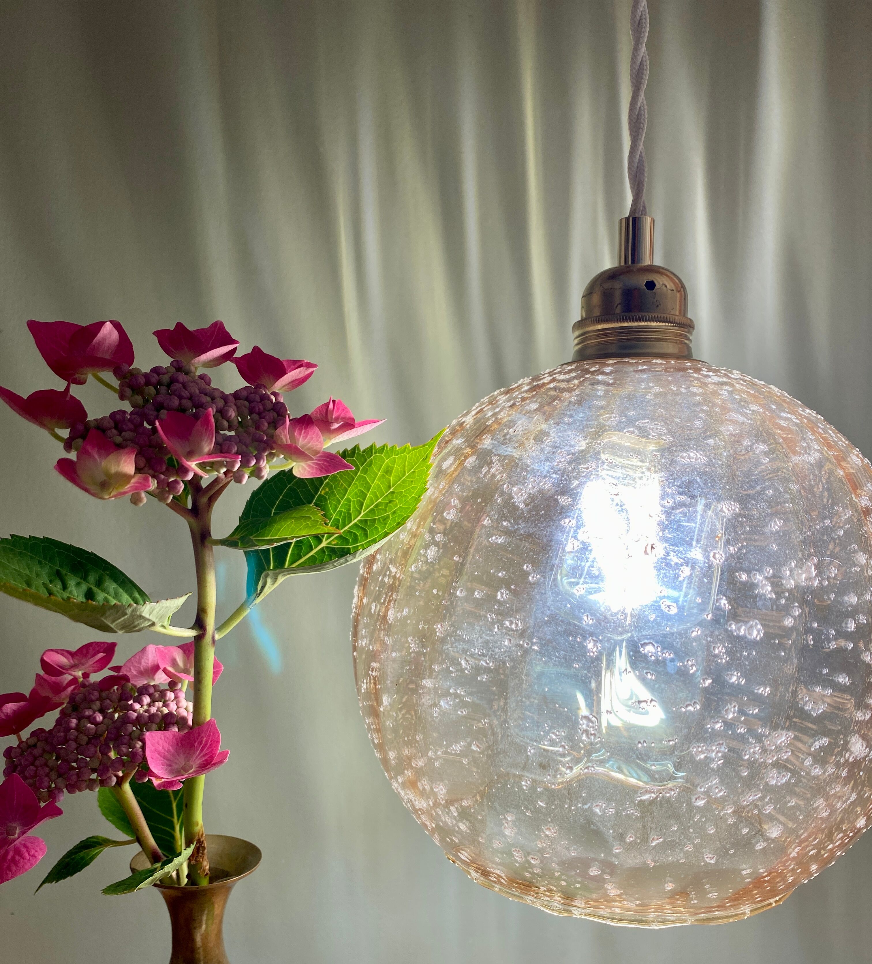Vintage globe pendant lamp in amber glass
