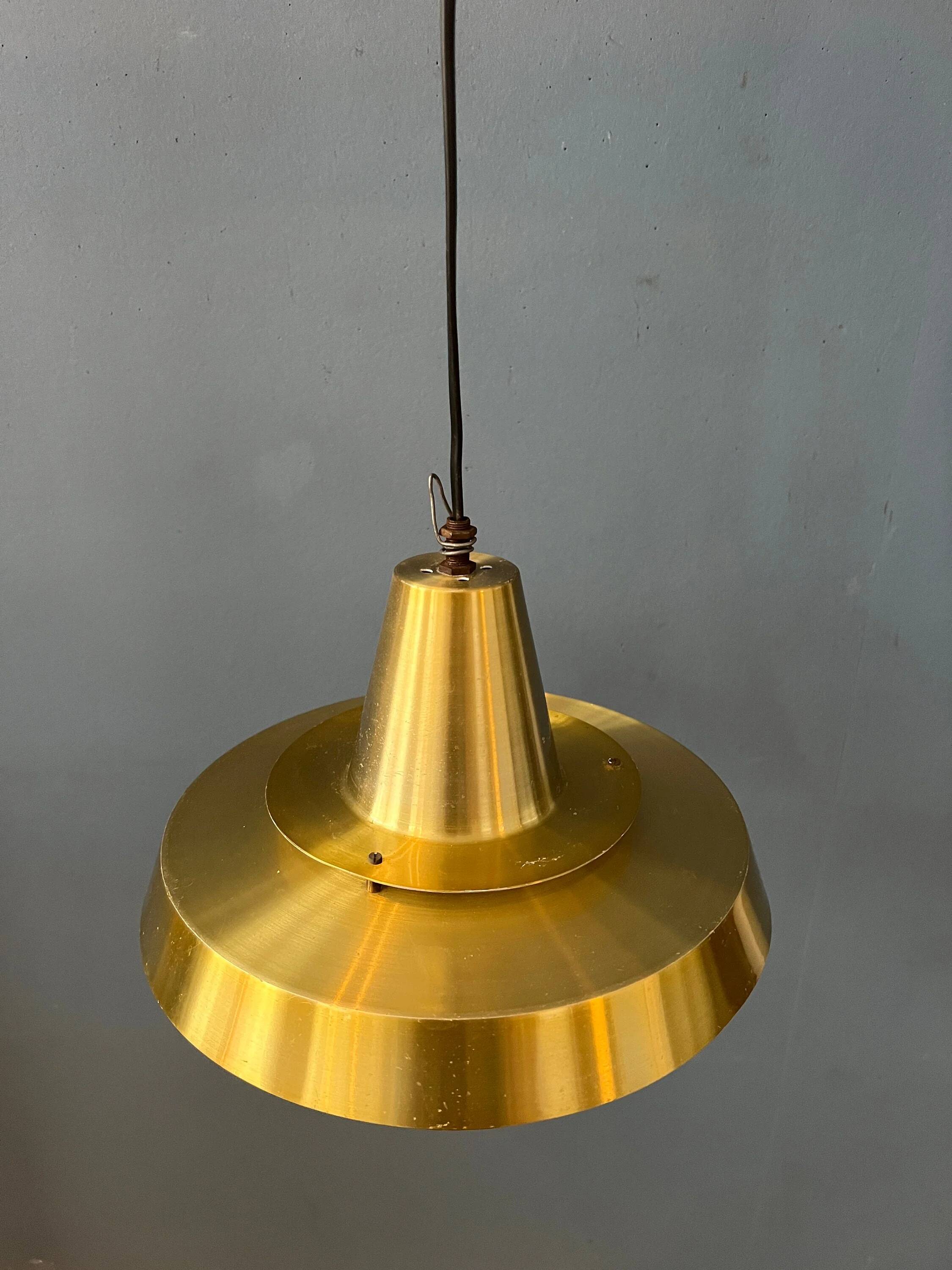 Mid-century Danish style orange brass suspension light.
