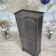Strafor double-door corrugated iron cloakroom, circa 1920.