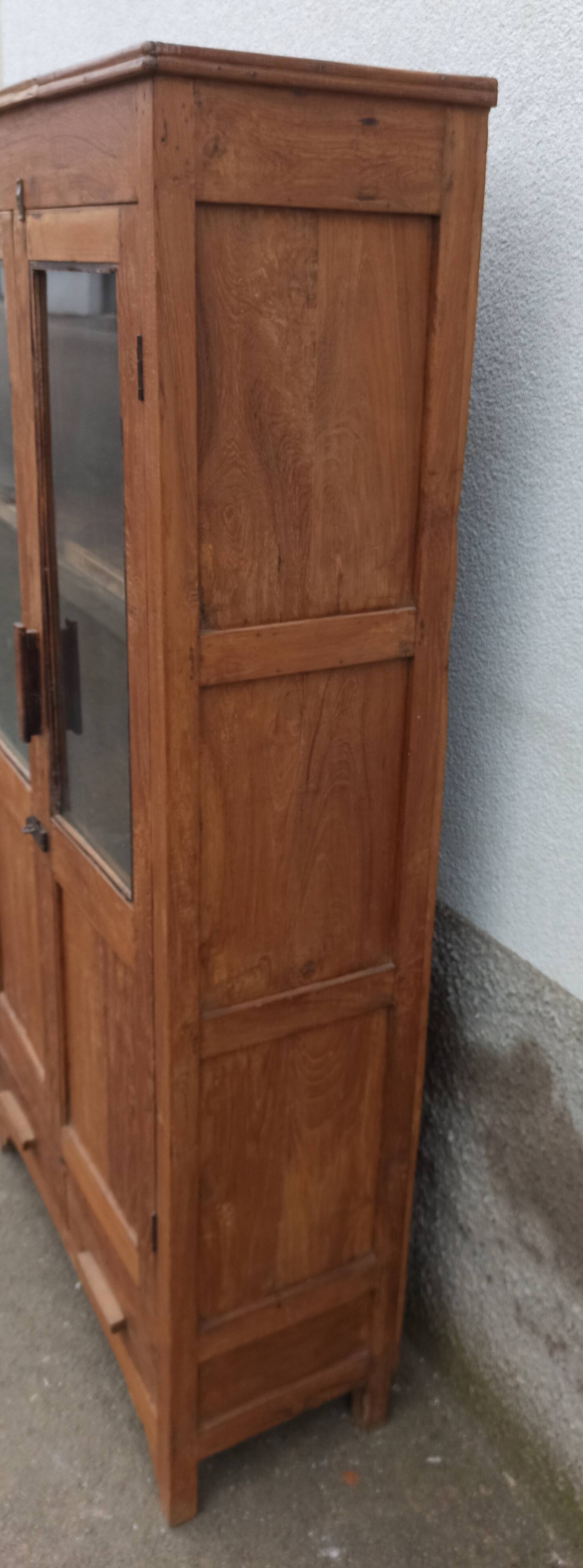 Old glazed teak cabinet