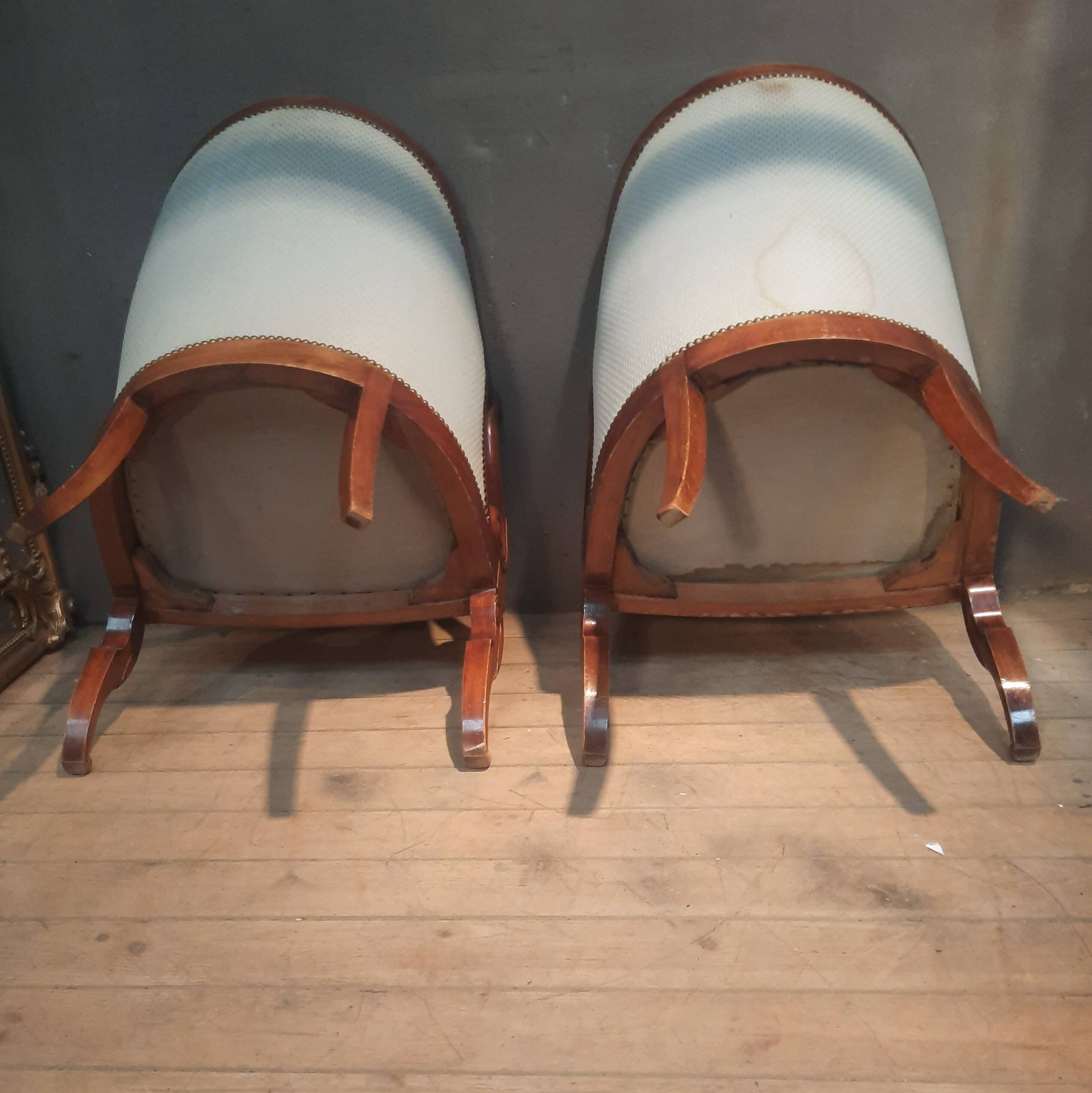 Pair of swan neck gondola armchairs