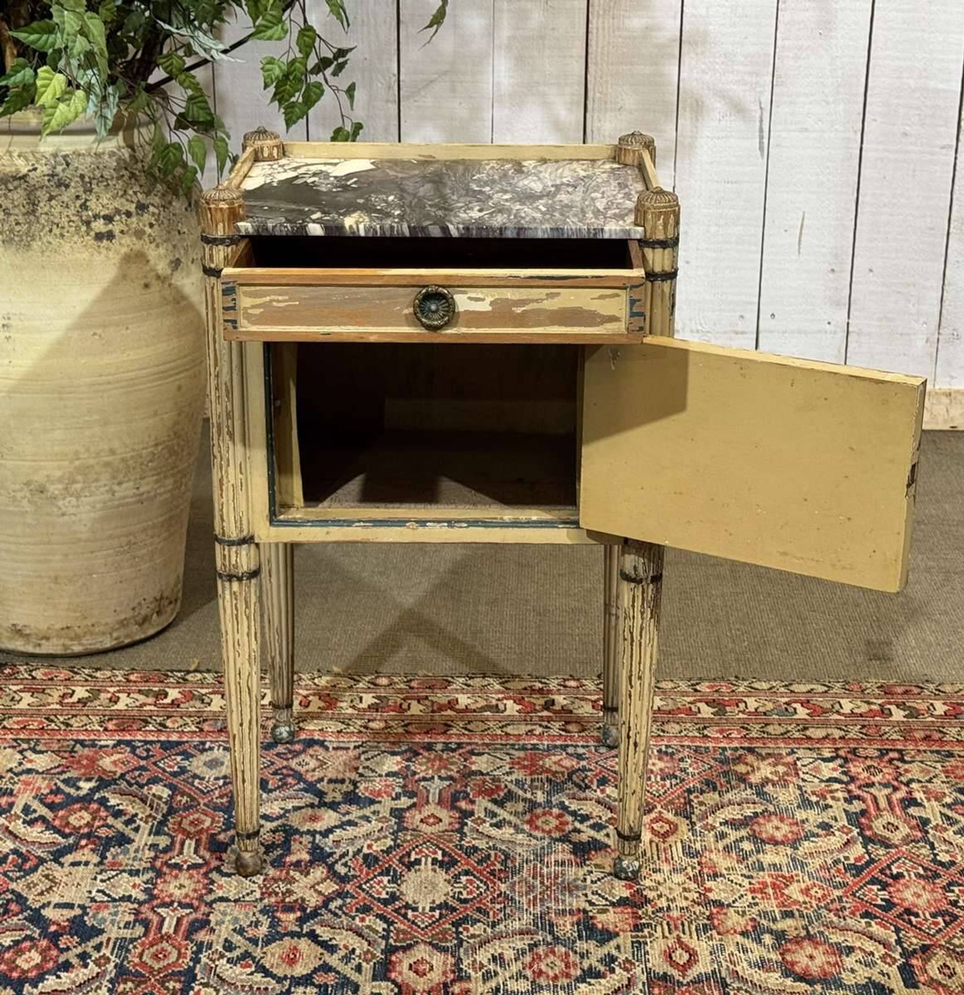 Beech bedside table painted with a marble top in Louis XVI style from the late 19th century.
