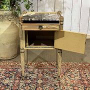 Beech bedside table painted with a marble top in Louis XVI style from the late 19th century.
