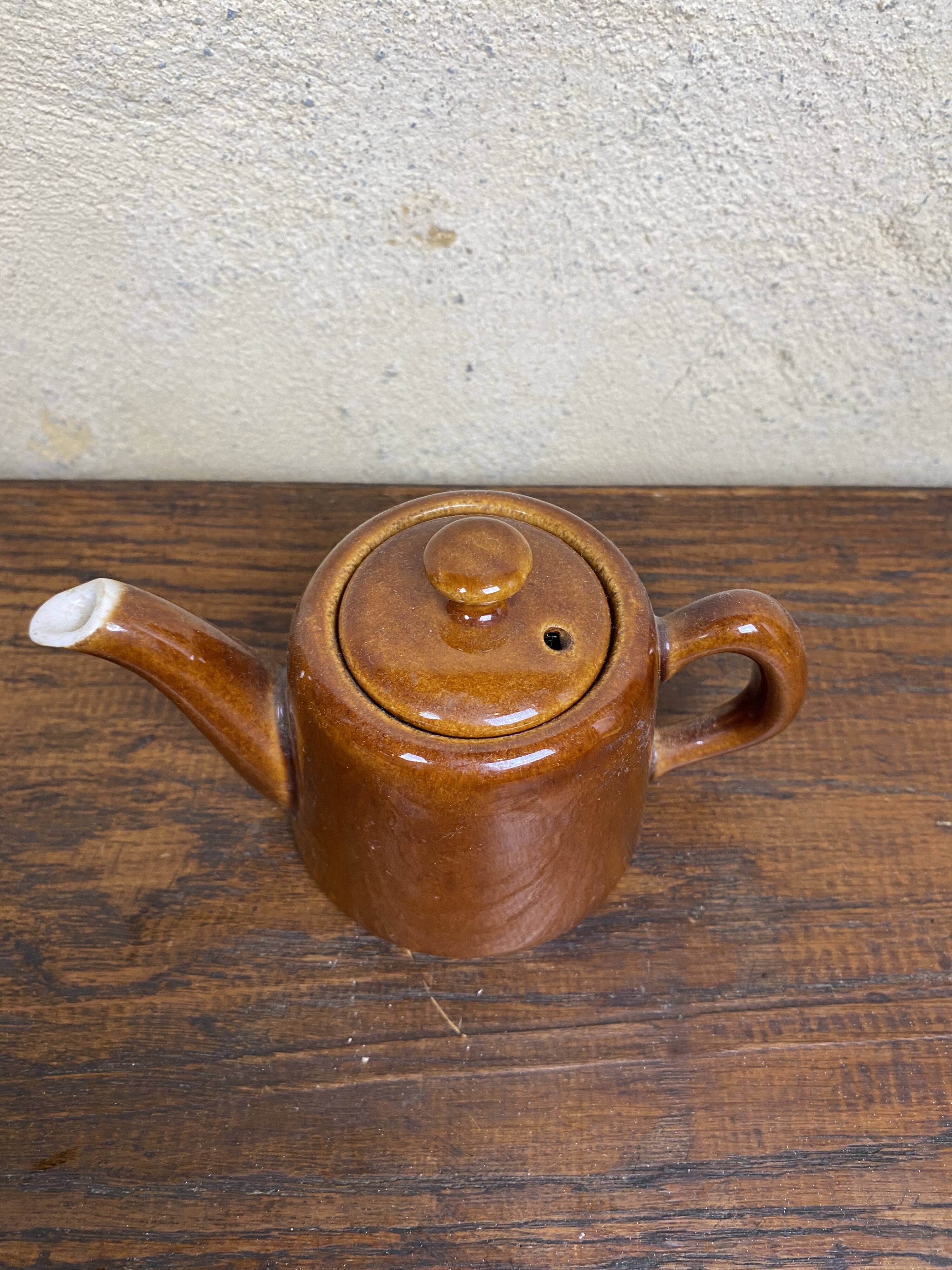 Small vintage brown teapot