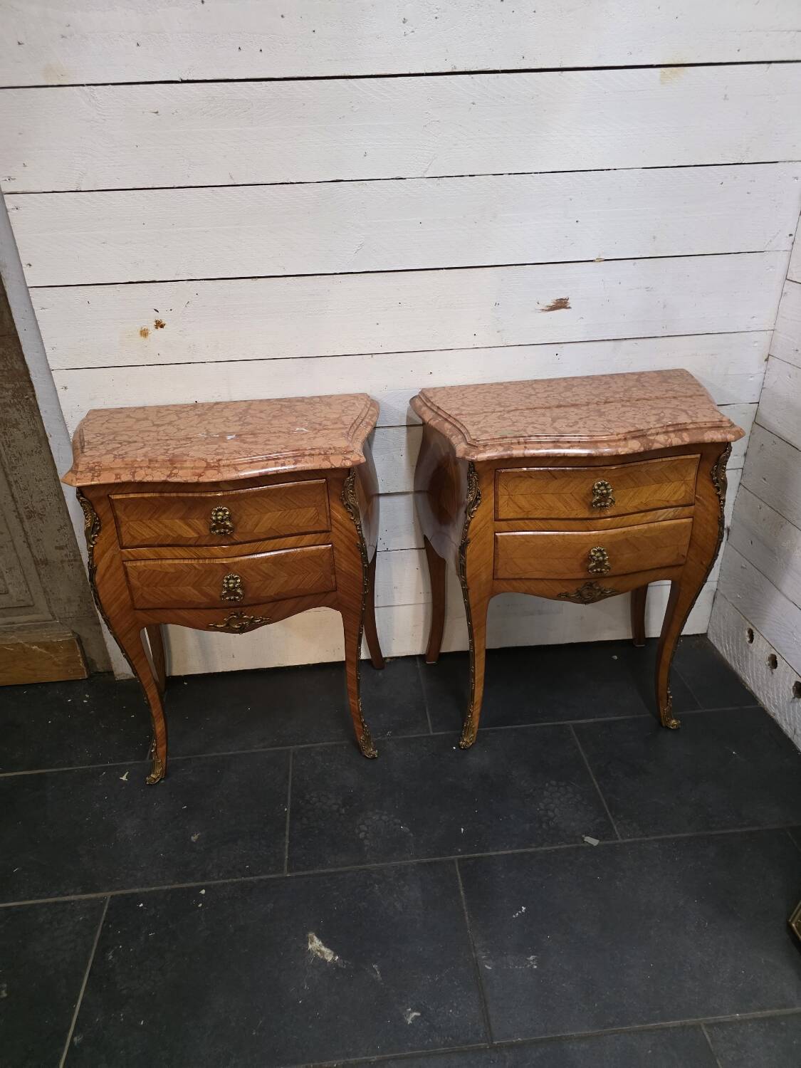 Pair of Louis XV style curved bedside tables in marquetry
