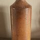 Vintage stoneware liqueur bottle with pouring spout