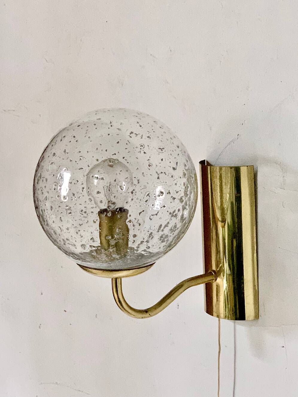 Pair of brass and glass wall sconces