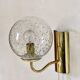 Pair of brass and glass wall sconces