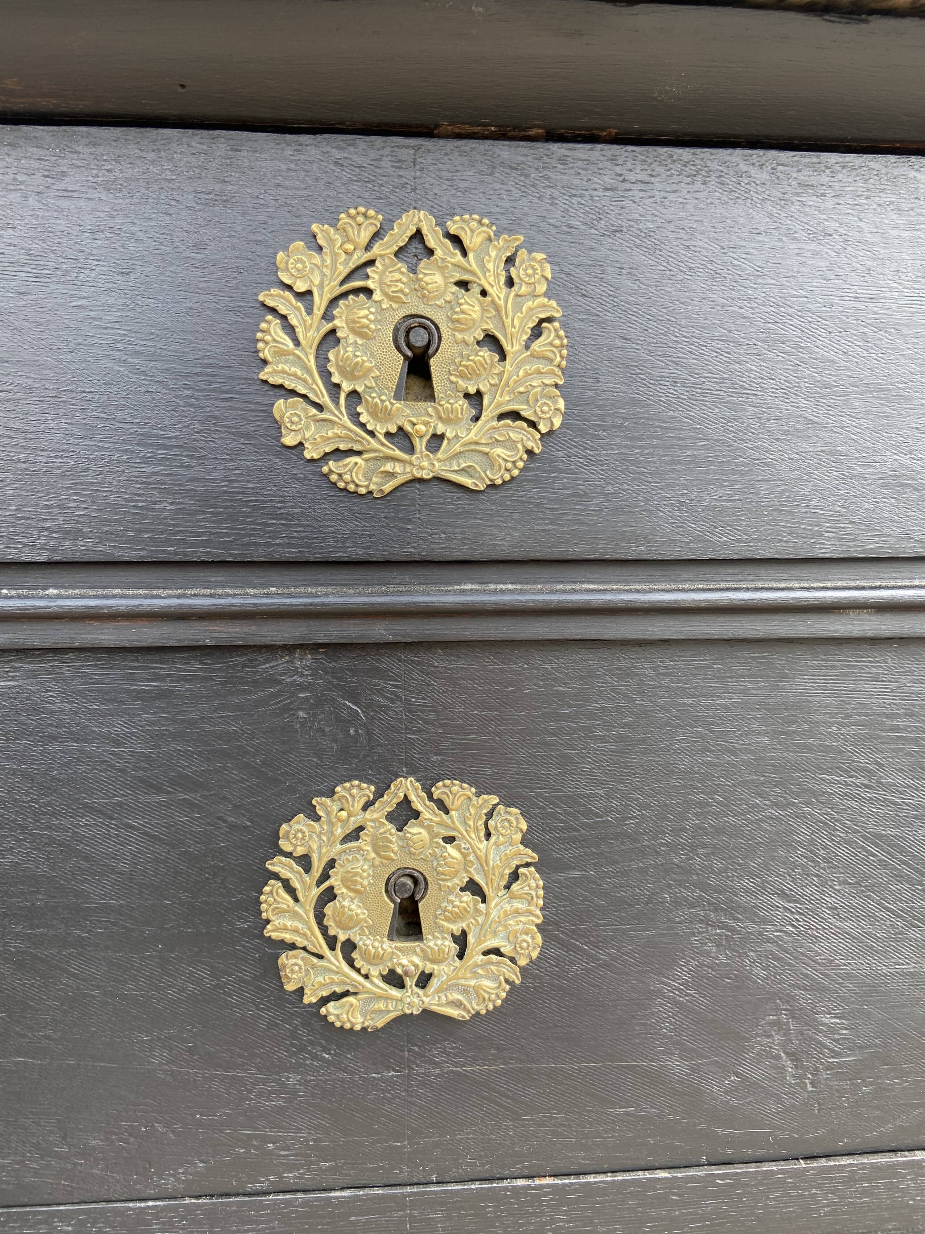 Old period chest of drawers black patinated