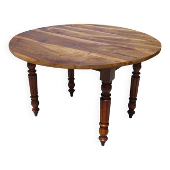 Round drop-leaf table made entirely of solid walnut