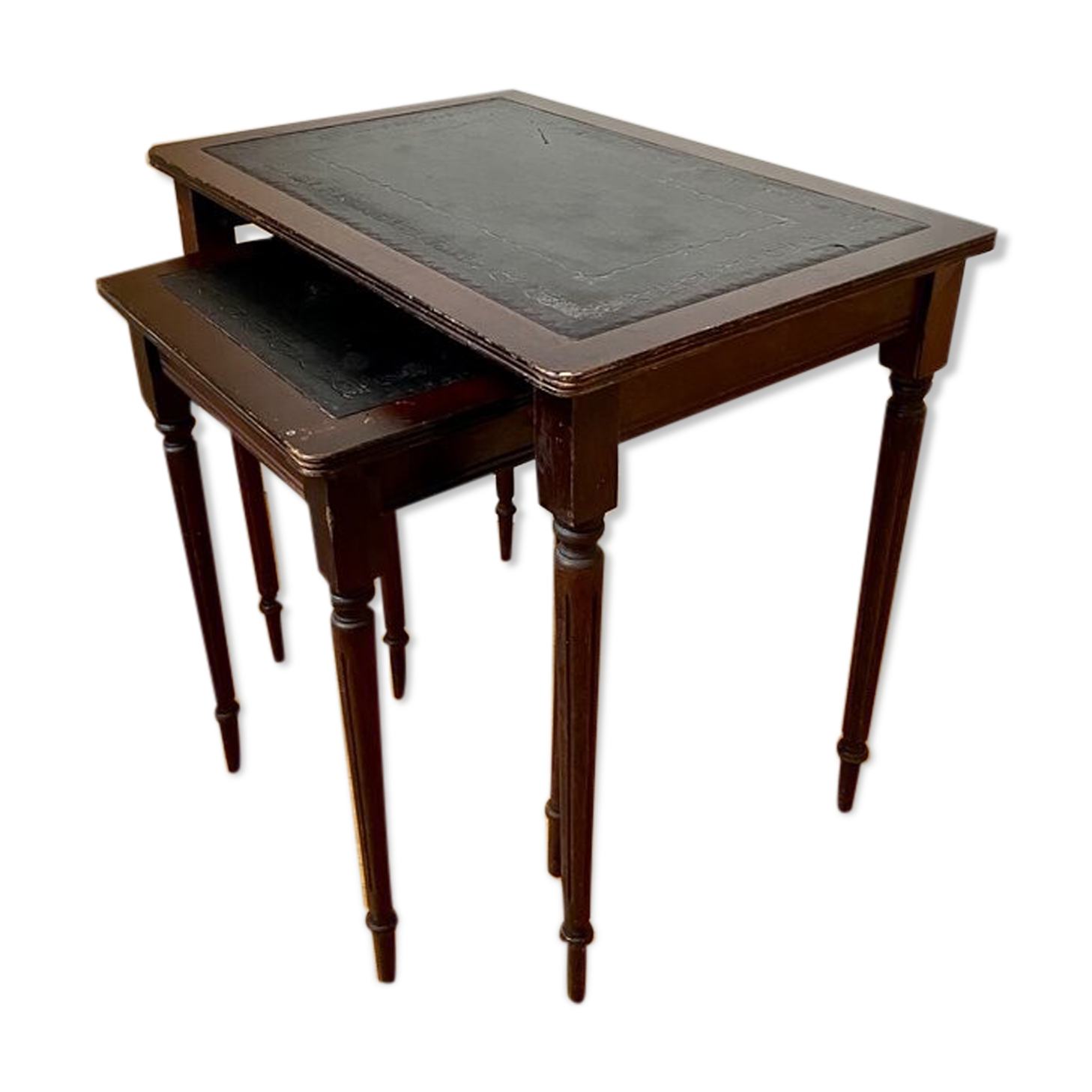 Dark wood and black leather tables