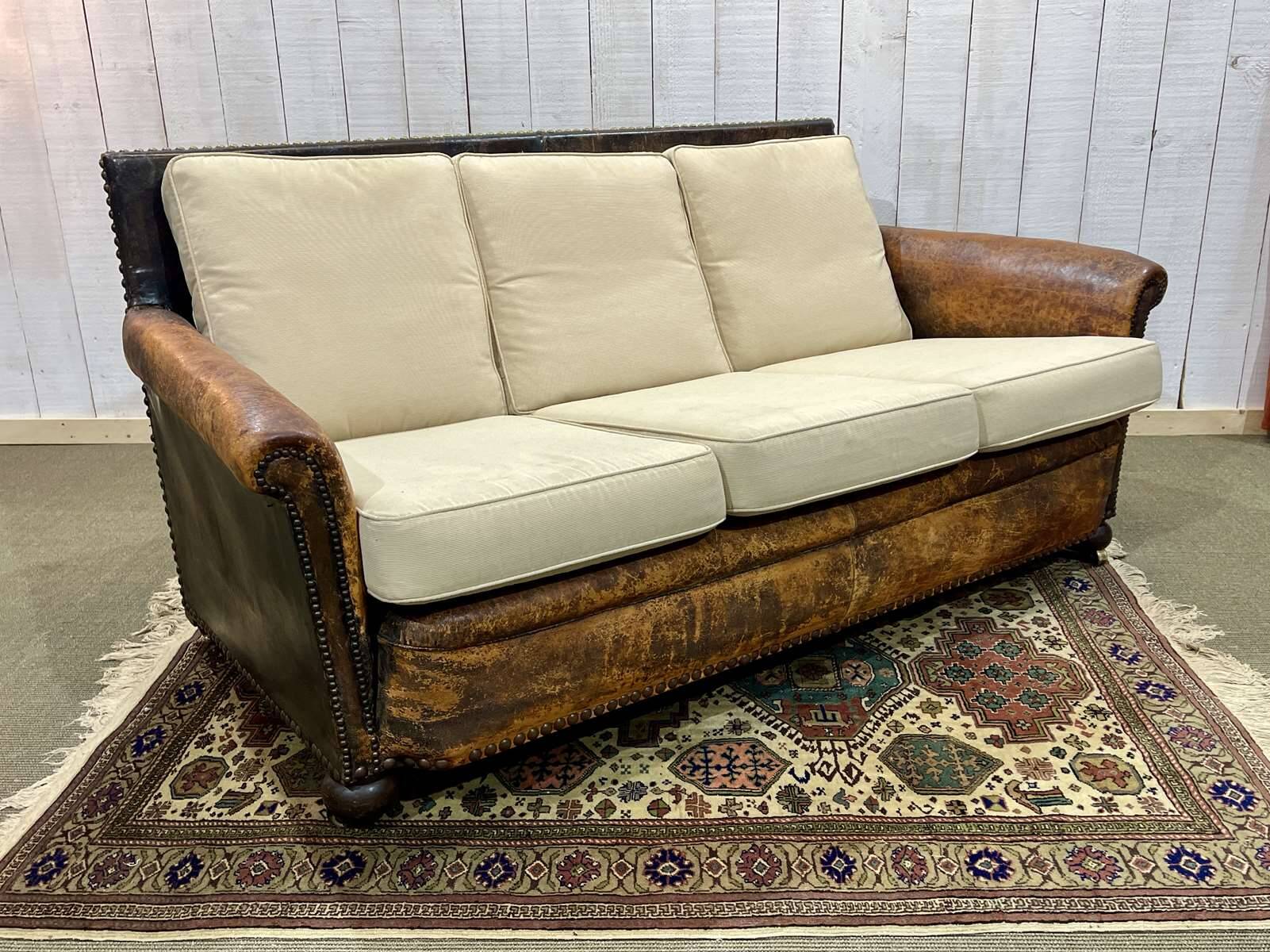 Early 20th century leather club sofa - seat and back in modern fabric
