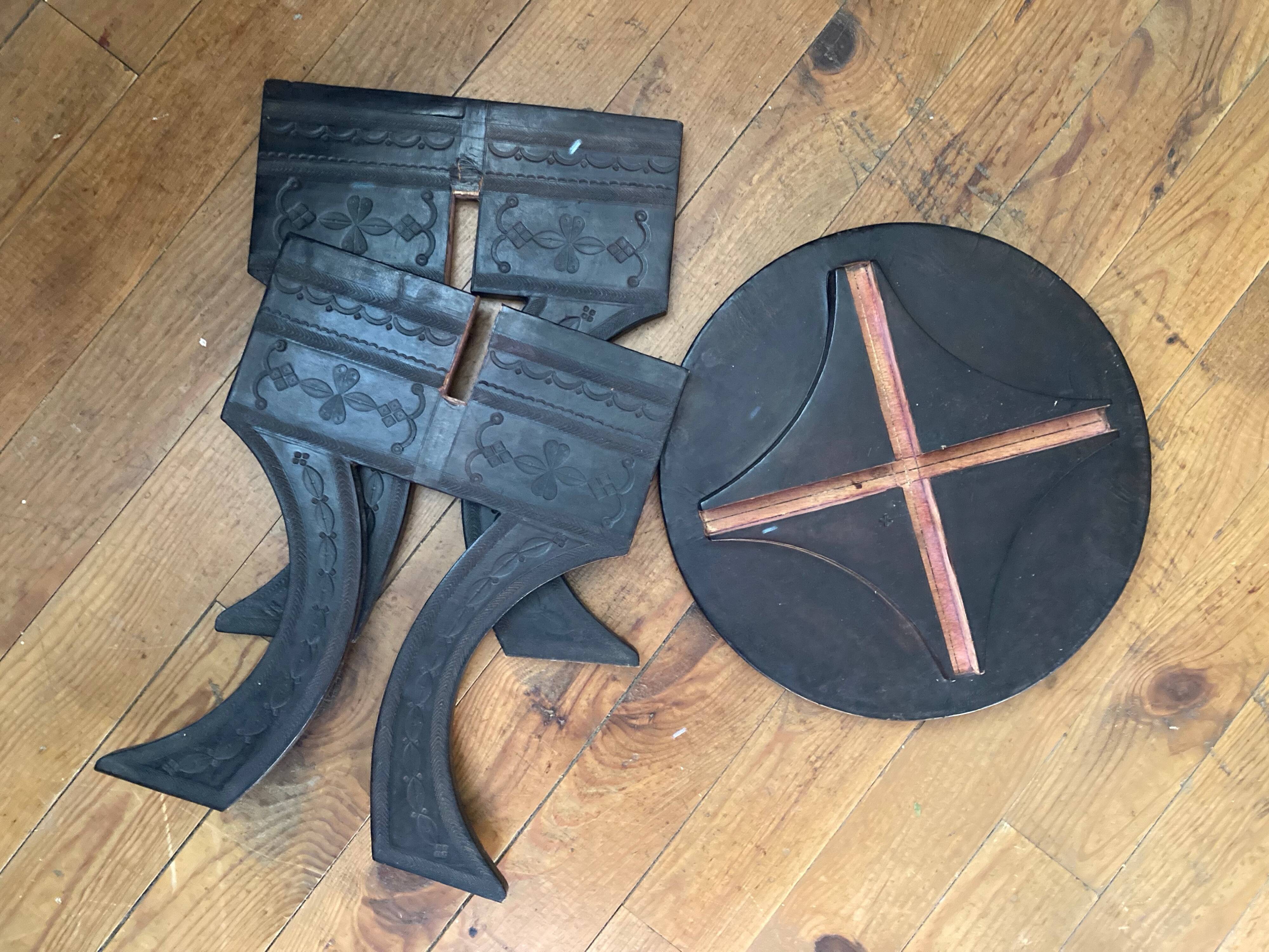 Touareg pedestal tables in wood and embossed leather