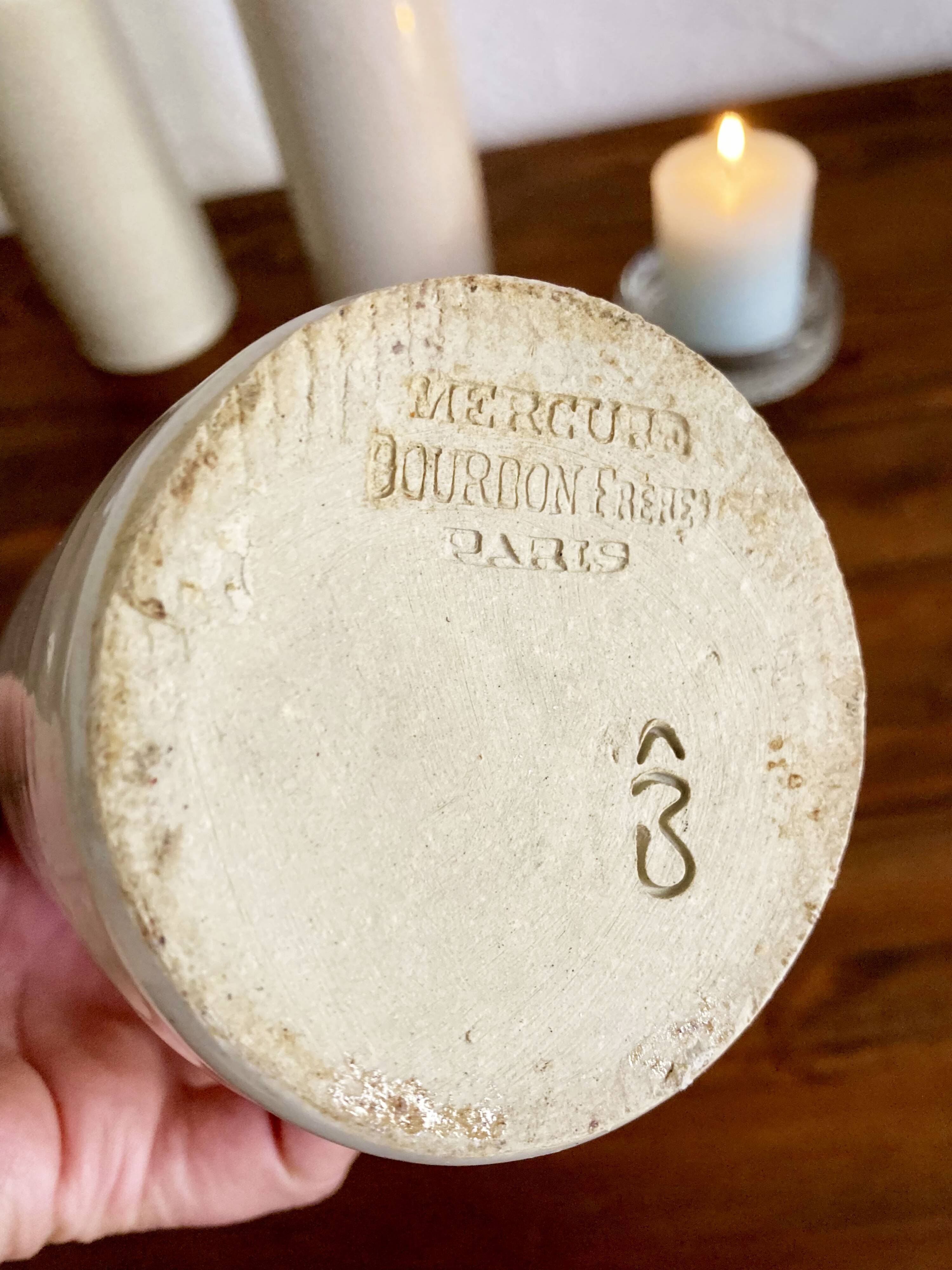 Trio of creamy white glazed stoneware bottles