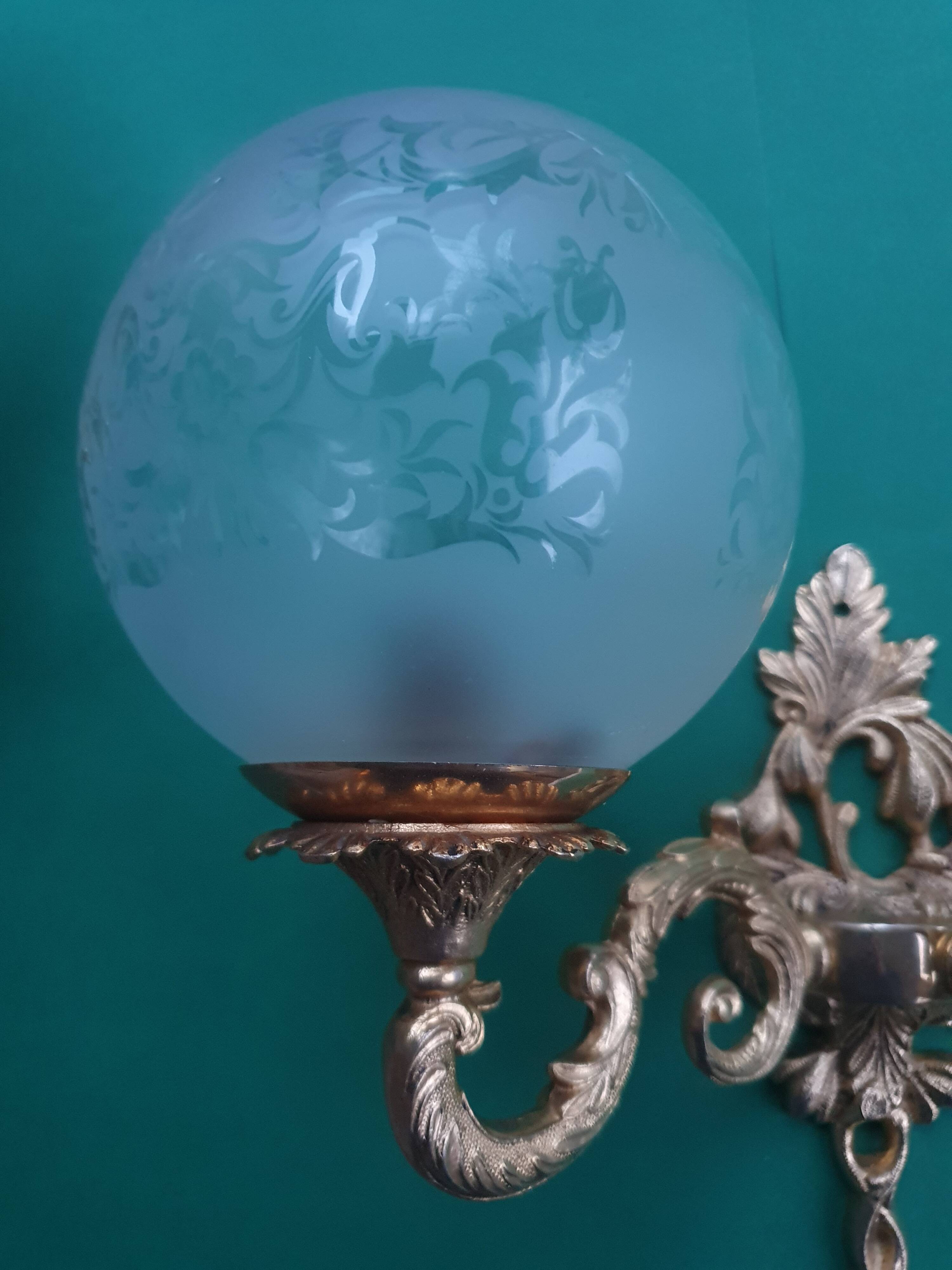 Pair of large double-light wall sconces in vintage brass and glass