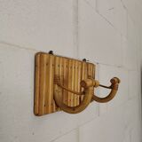 Wall coat holder in rattan